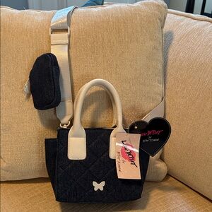 Betsey Johnson Black denim and Cream Mini Bag with Butterfly Accent.